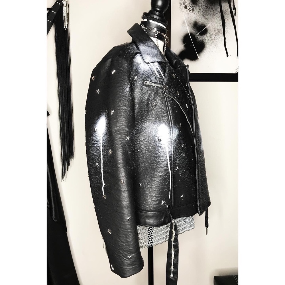 Star studded graffiti leather jacket